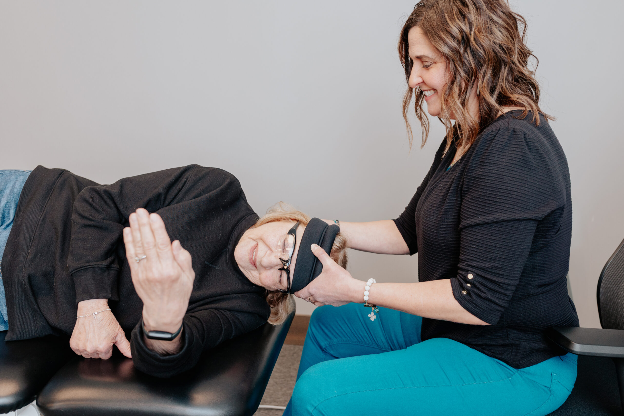 image of a patient laying down, receiving treatment